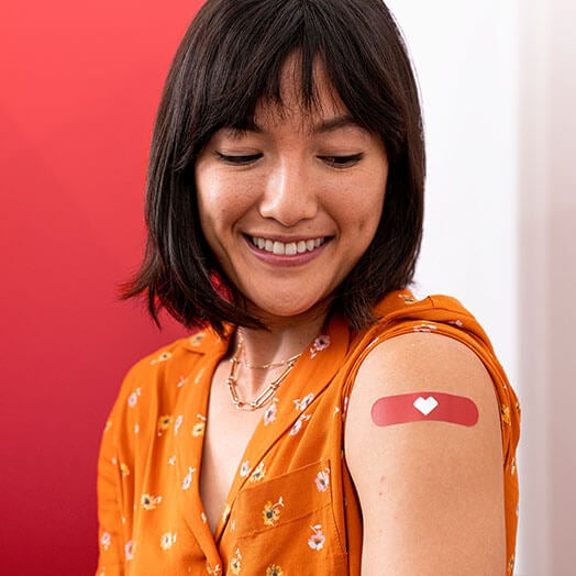 Patient with bandage after receiving vaccination at CVS pharmacy