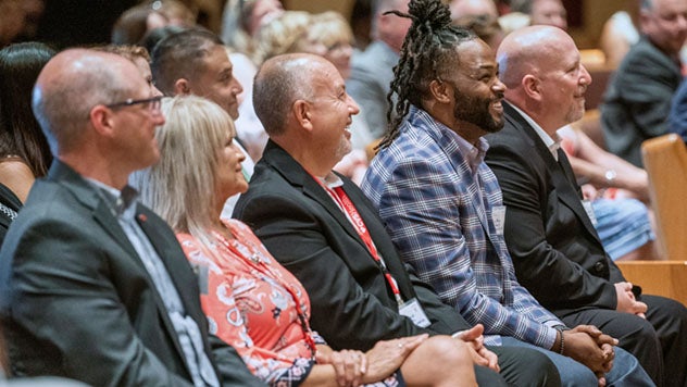 Large group of people sitting together