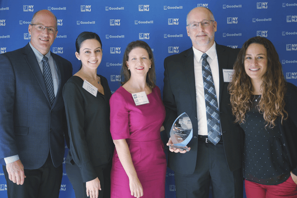 CVS Health colleagues pose with their Goodwill award.