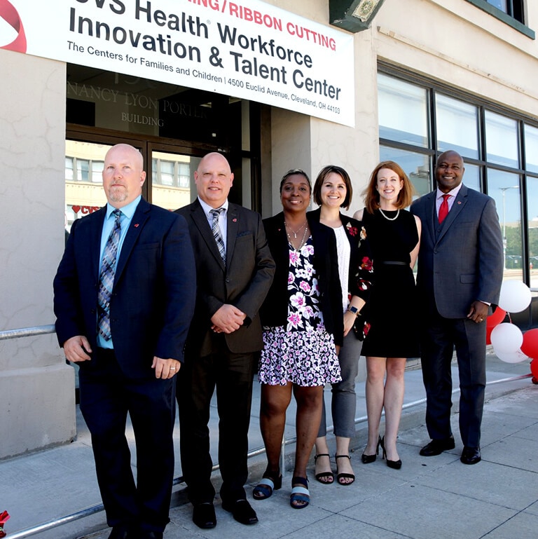 Several CVS Health employees standing outside of the Cleveland, Ohio Workforce Innovation and Talent Center.