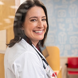 A CVS nurse practitioner smiling
