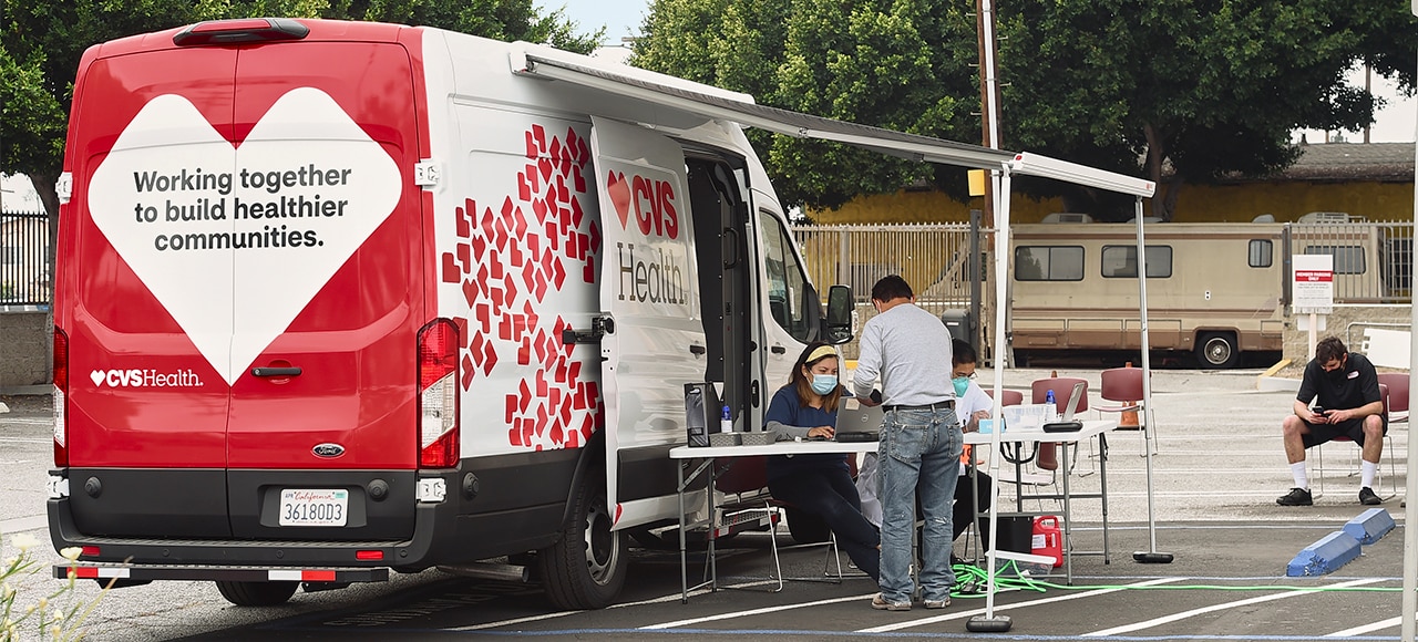 Project Health truck in a parking lot at a local community event