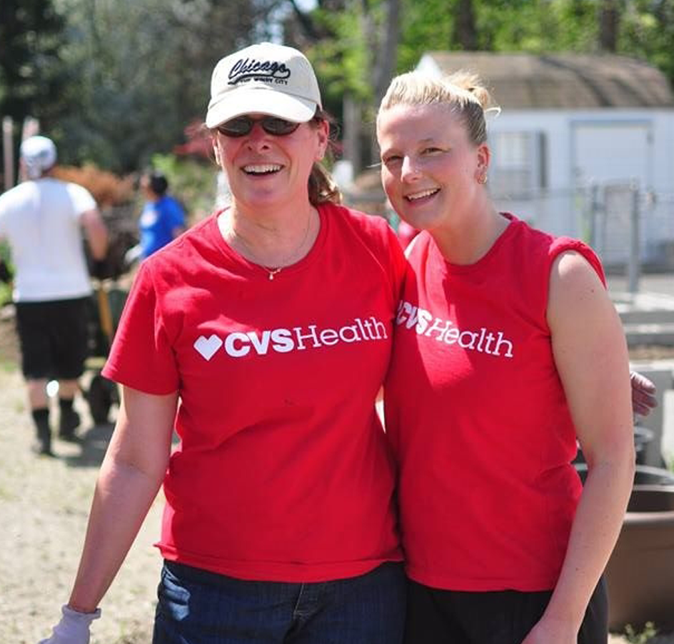 Two CVS Health employees volunteering in their community