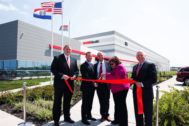 Officials cut the ribbon at the new Kansas City distribution center.