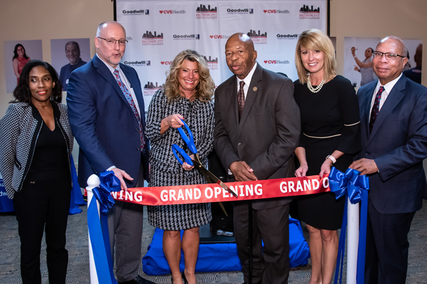 Officials cut the ribbon at the new mock CVS Pharmacy.