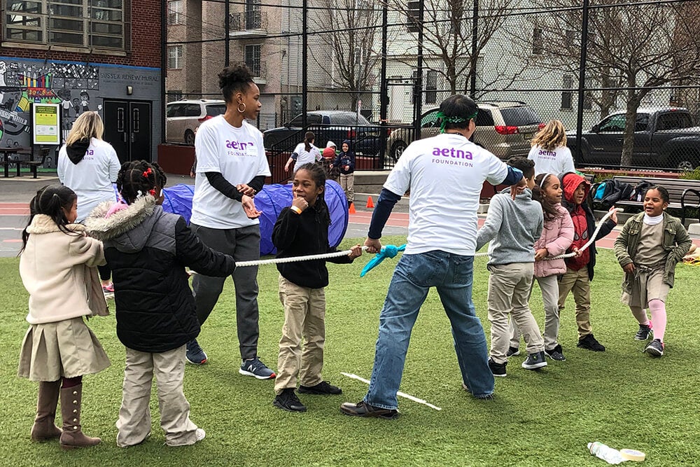 More than 30 Aetna and CVS employees volunteered alongside Sussex Avenue students.