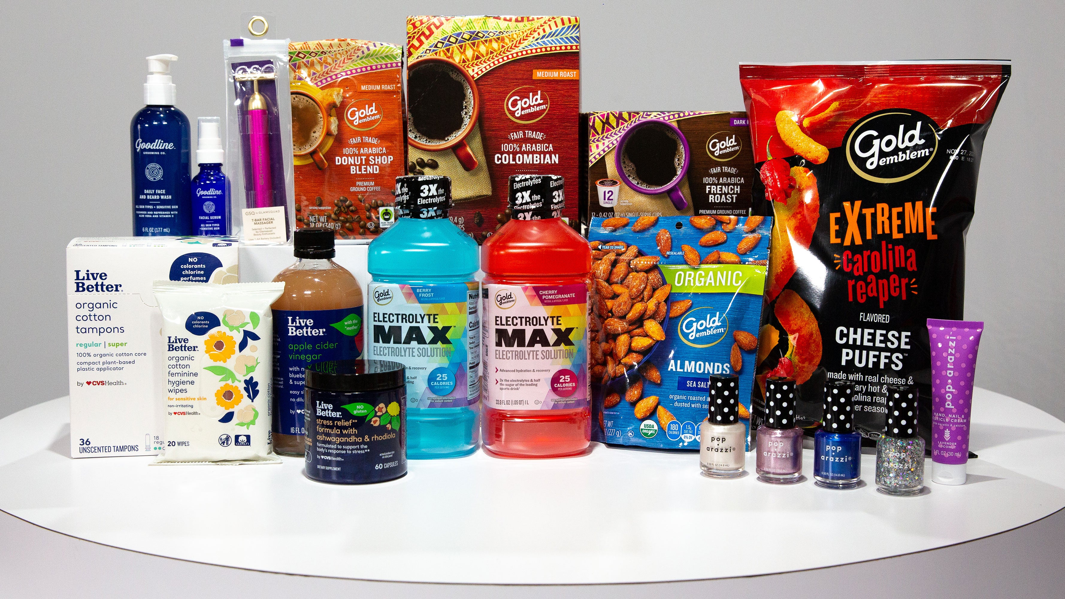 A table loaded with CVS Pharmacy exclusive store brand line products.