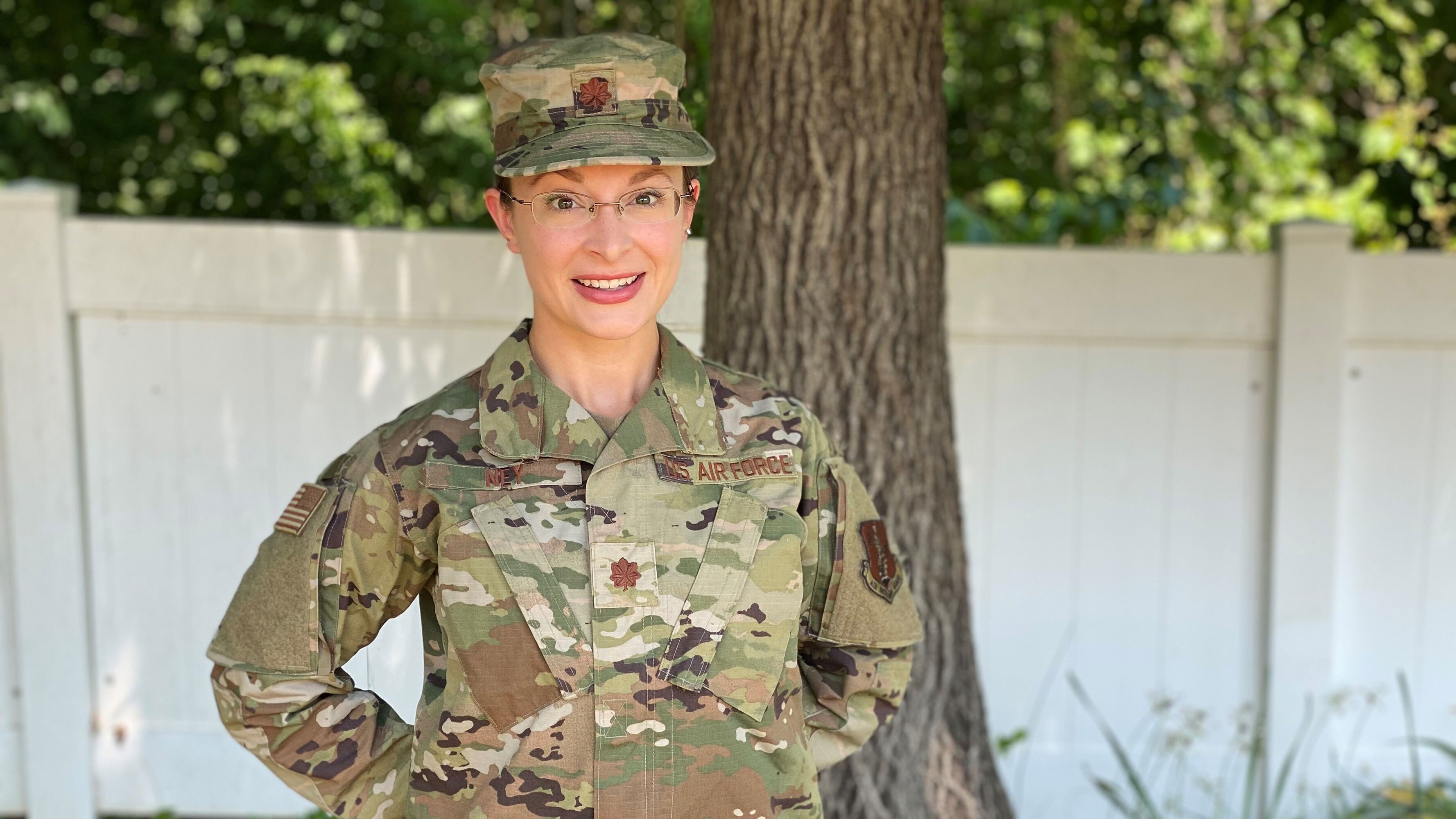 Major Alison Ney stands at-ease in her fatigues.