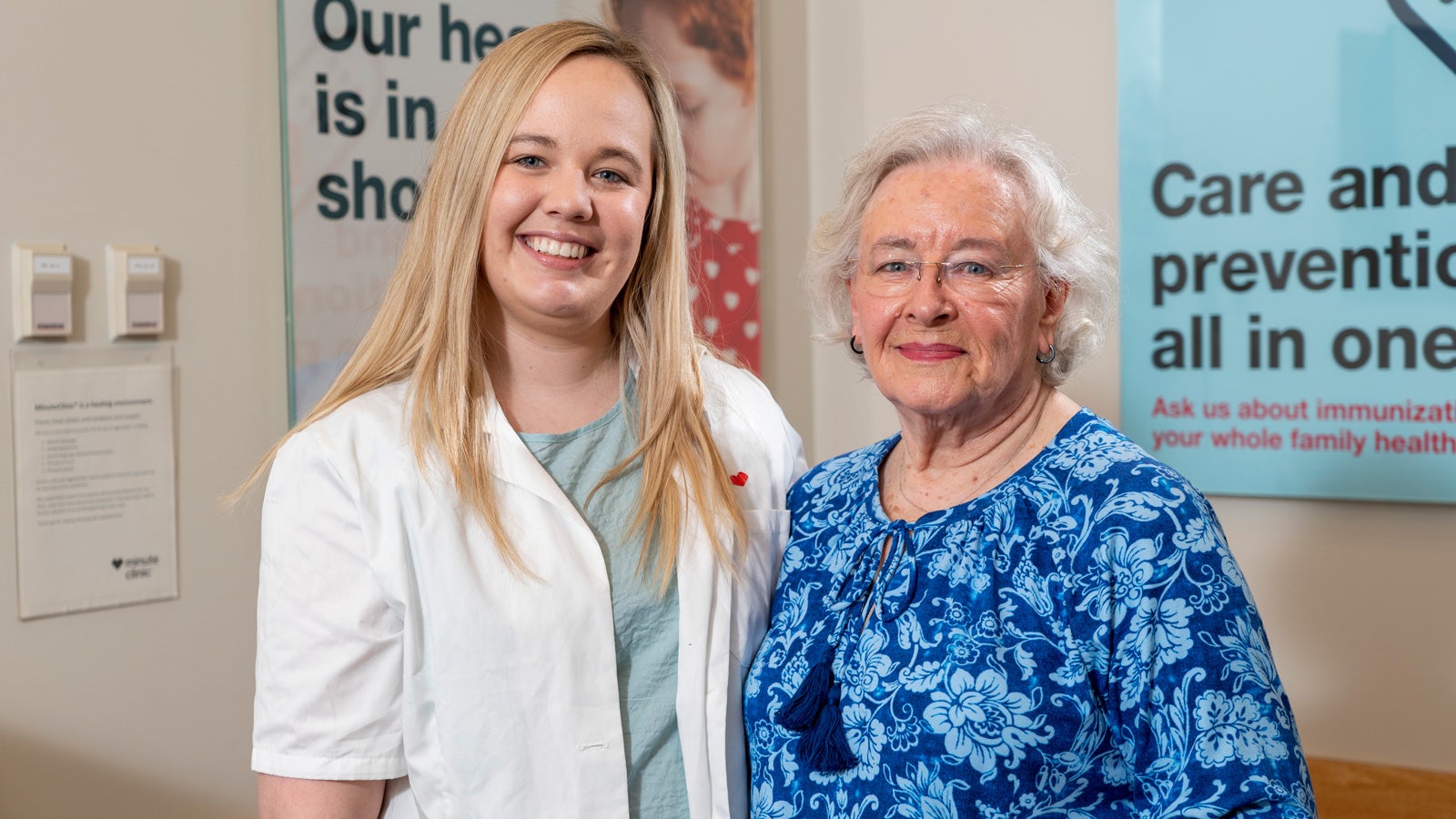 Laura Boaumartner and Charlotte Ostrom smile in a CVS Pharmacy location