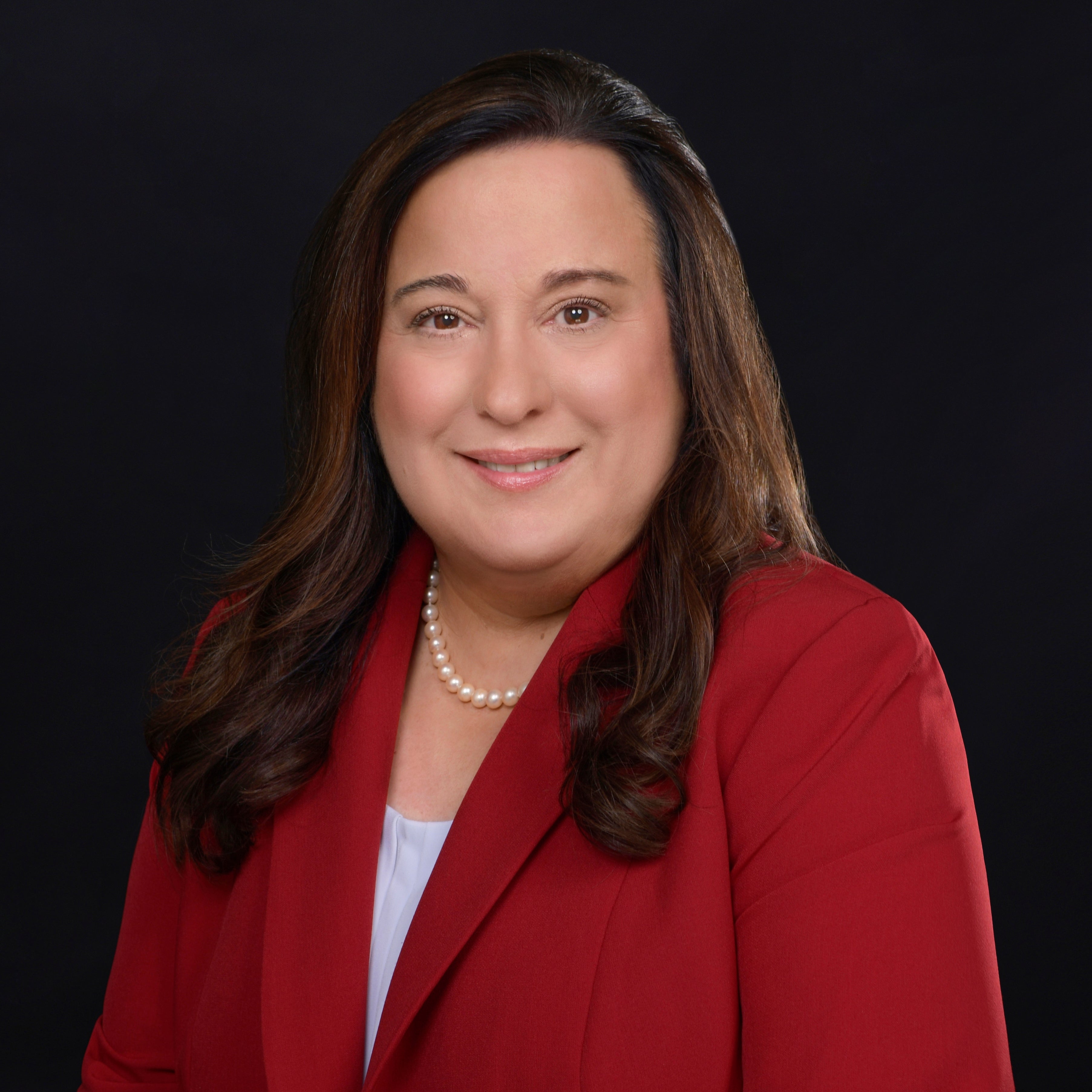 Cathy Moffitt, MD, FAAP, Senior Vice President and Aetna Chief Medical Officer, CVS Health, in front of black background