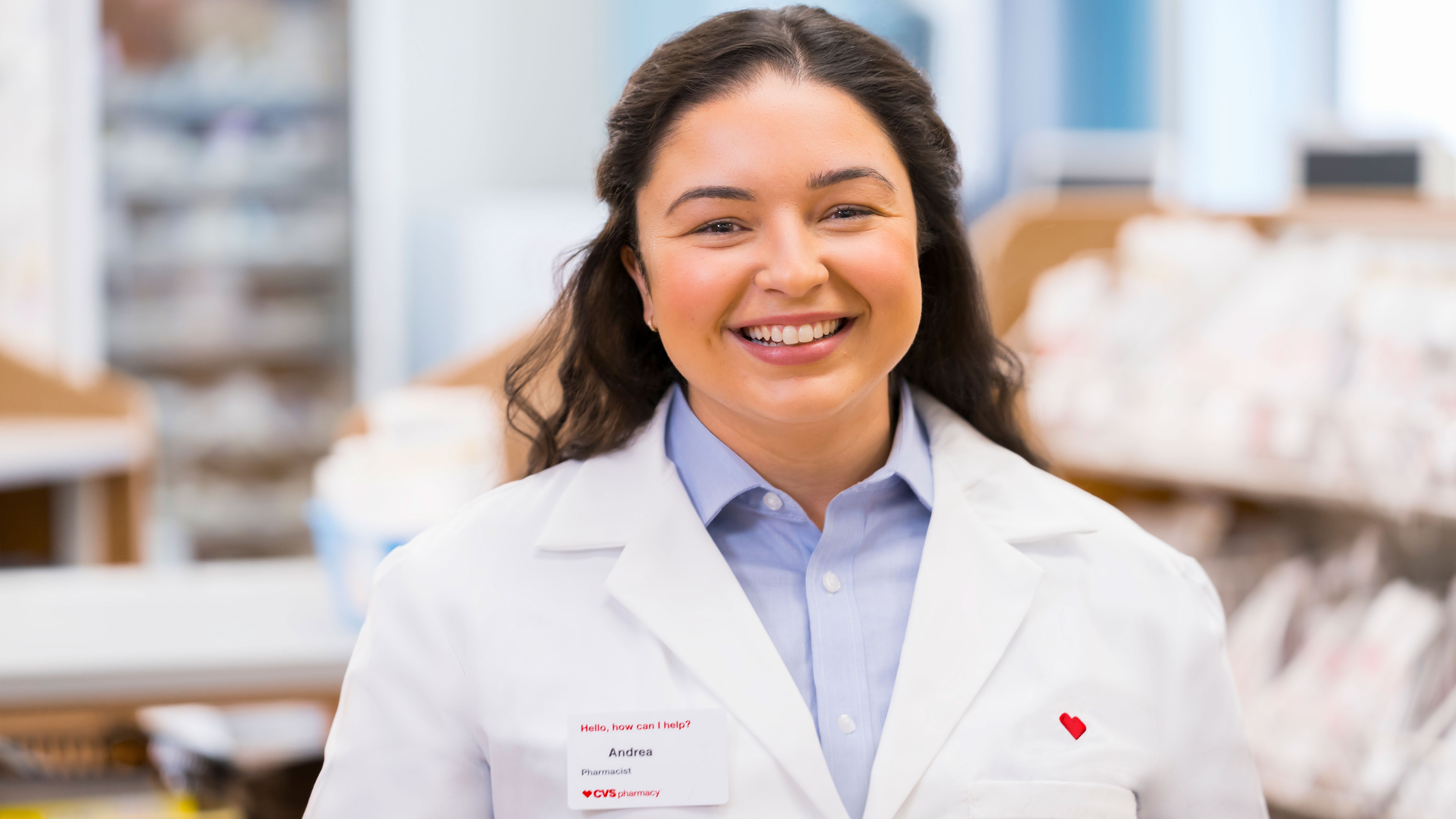 Female CVS pharmacist smiling