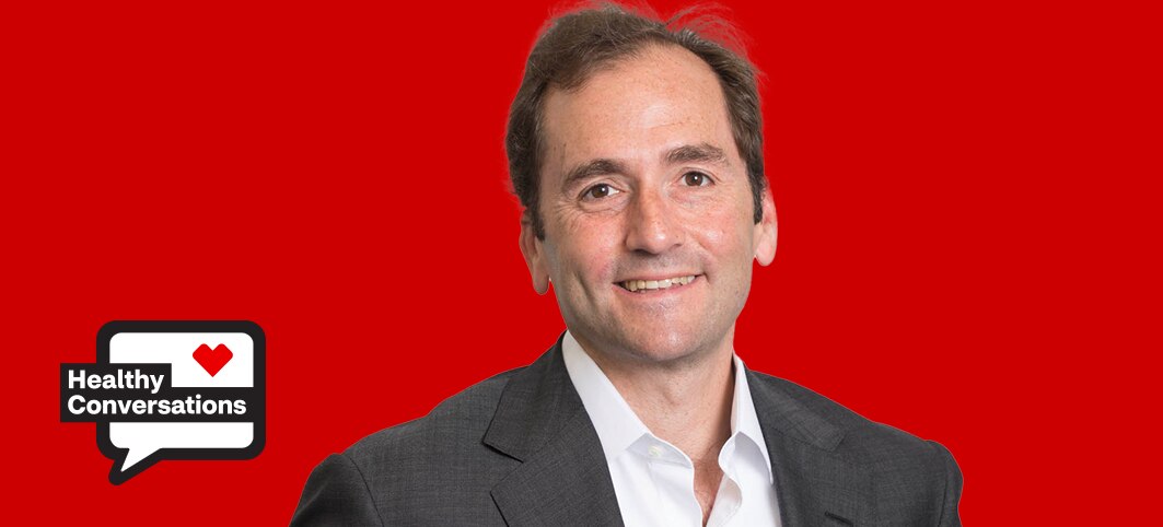 Dr. Seth Feuerstein, CEO of Oui Therapeutics, in front of red background