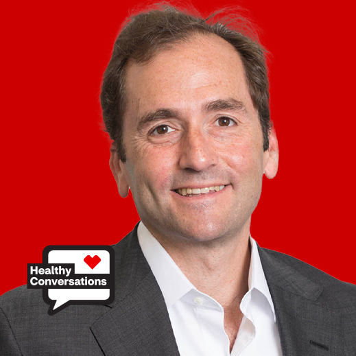 Dr. Seth Feuerstein, CEO of Oui Therapeutics, in front of red background