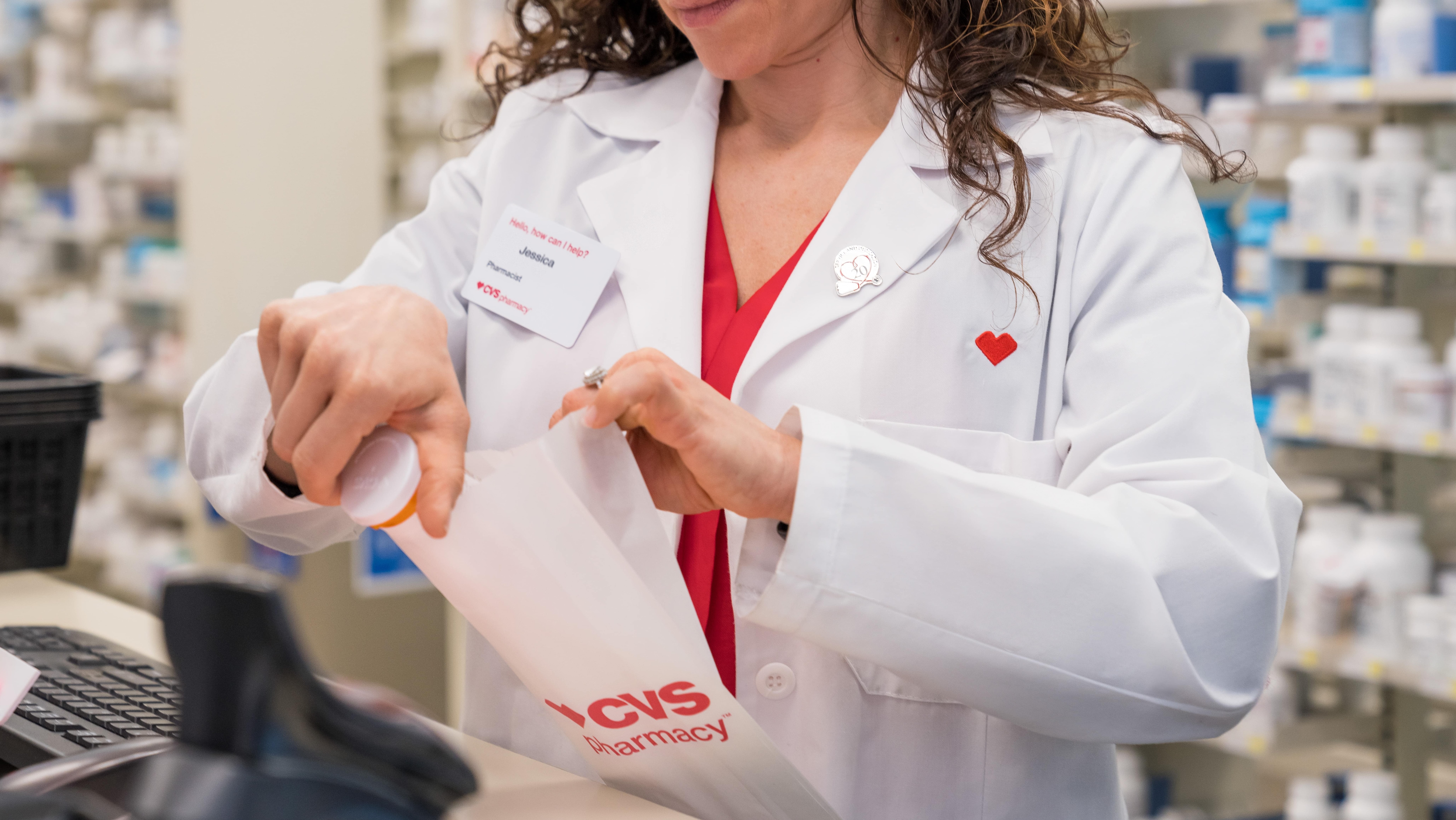 Pharmacist fills prescription