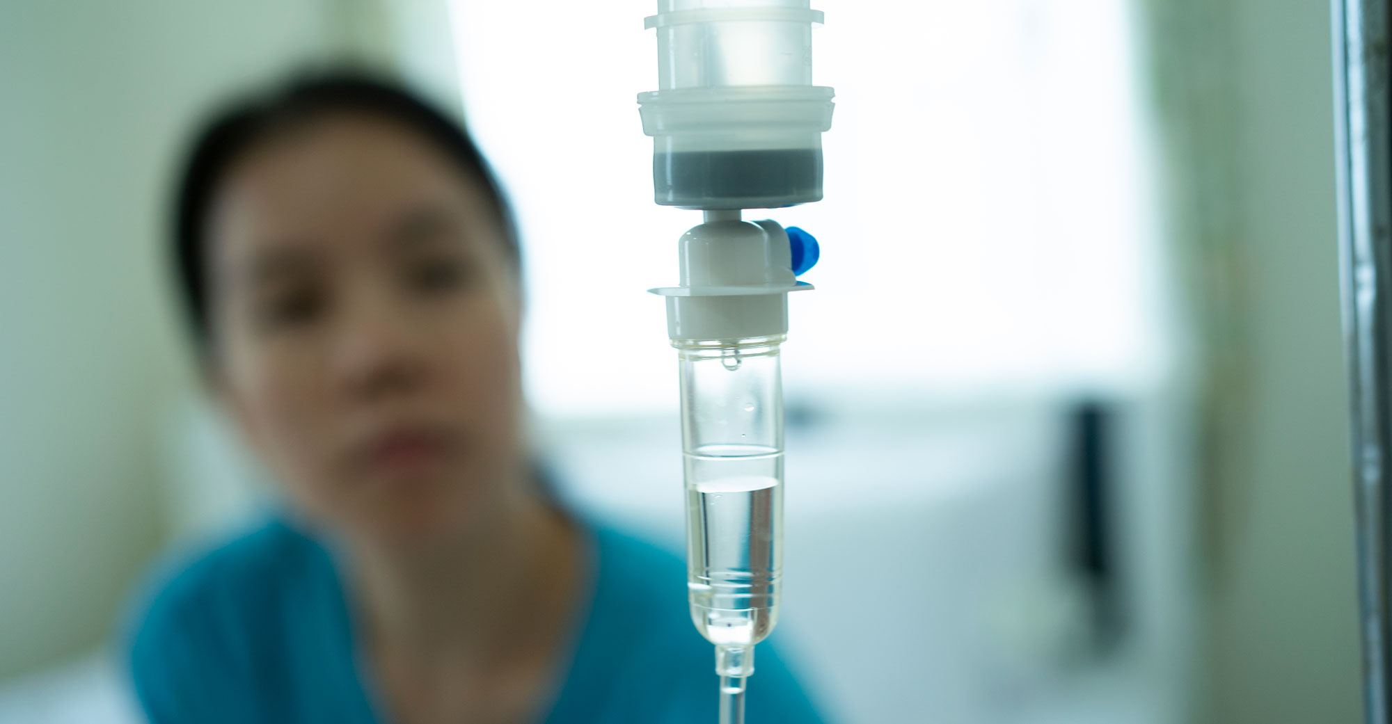 Doctor checking an IV