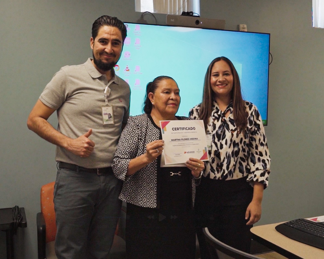 certificate being presented to Martha Medina