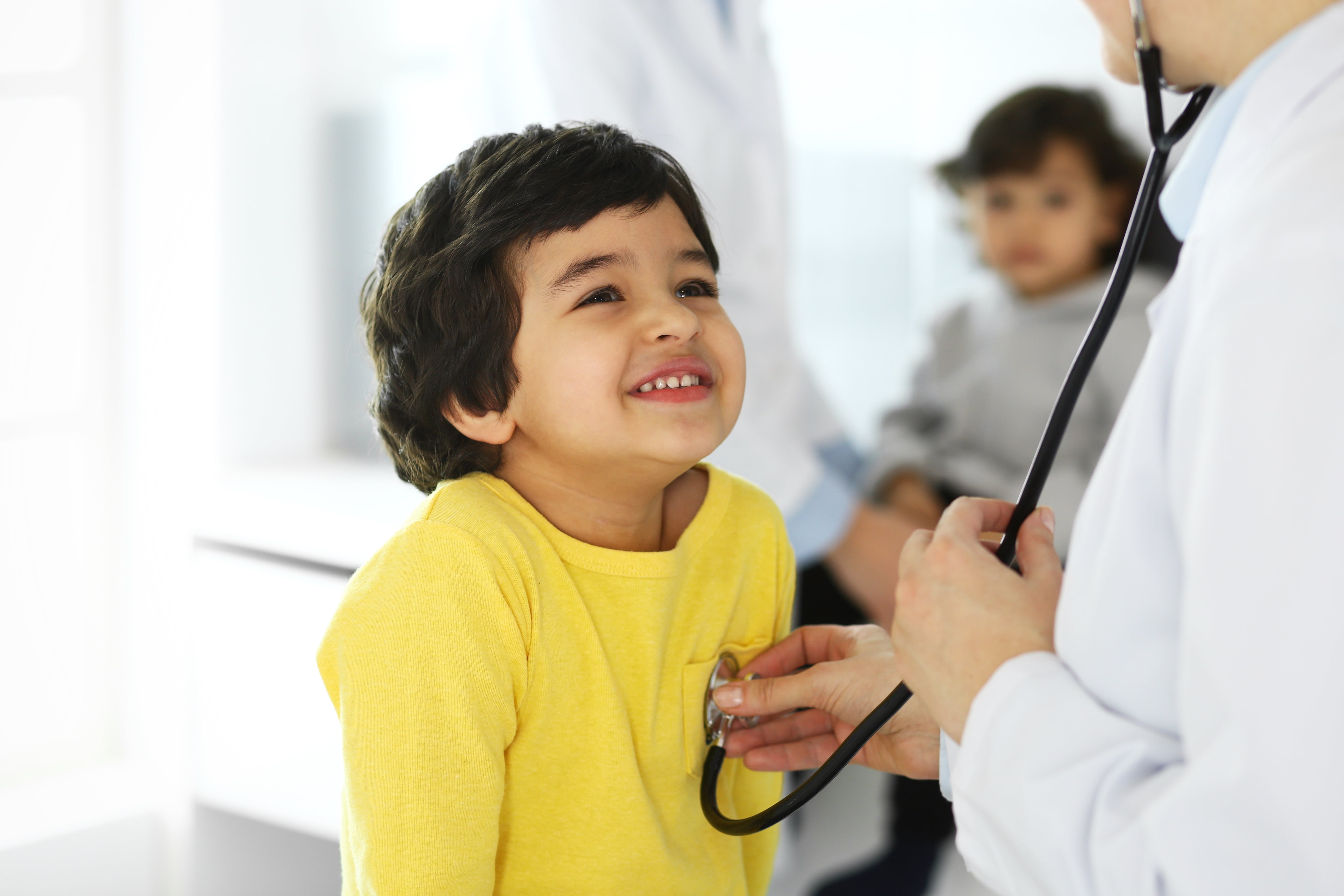 A child being examined by a doctor