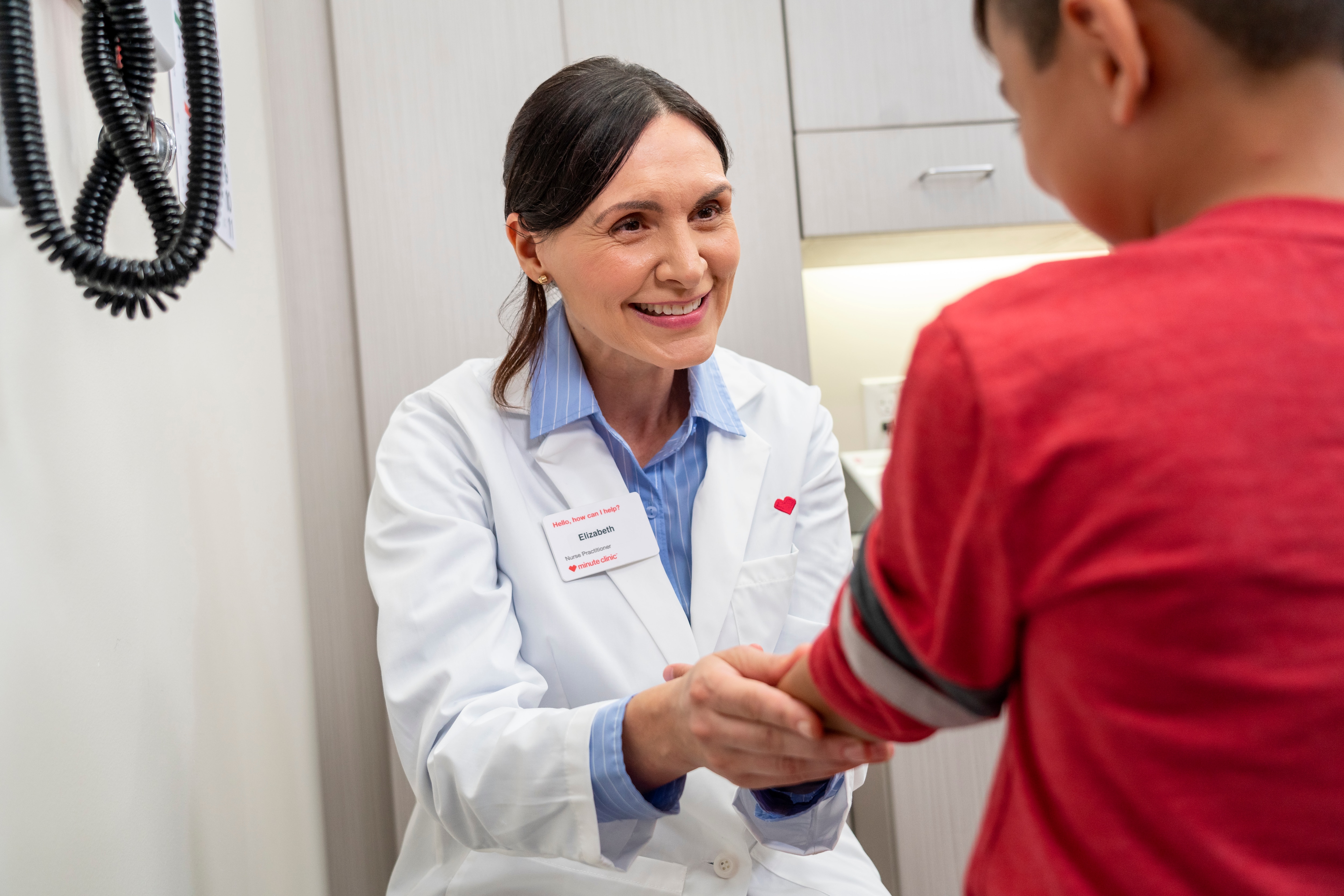 Doctor helping a patient