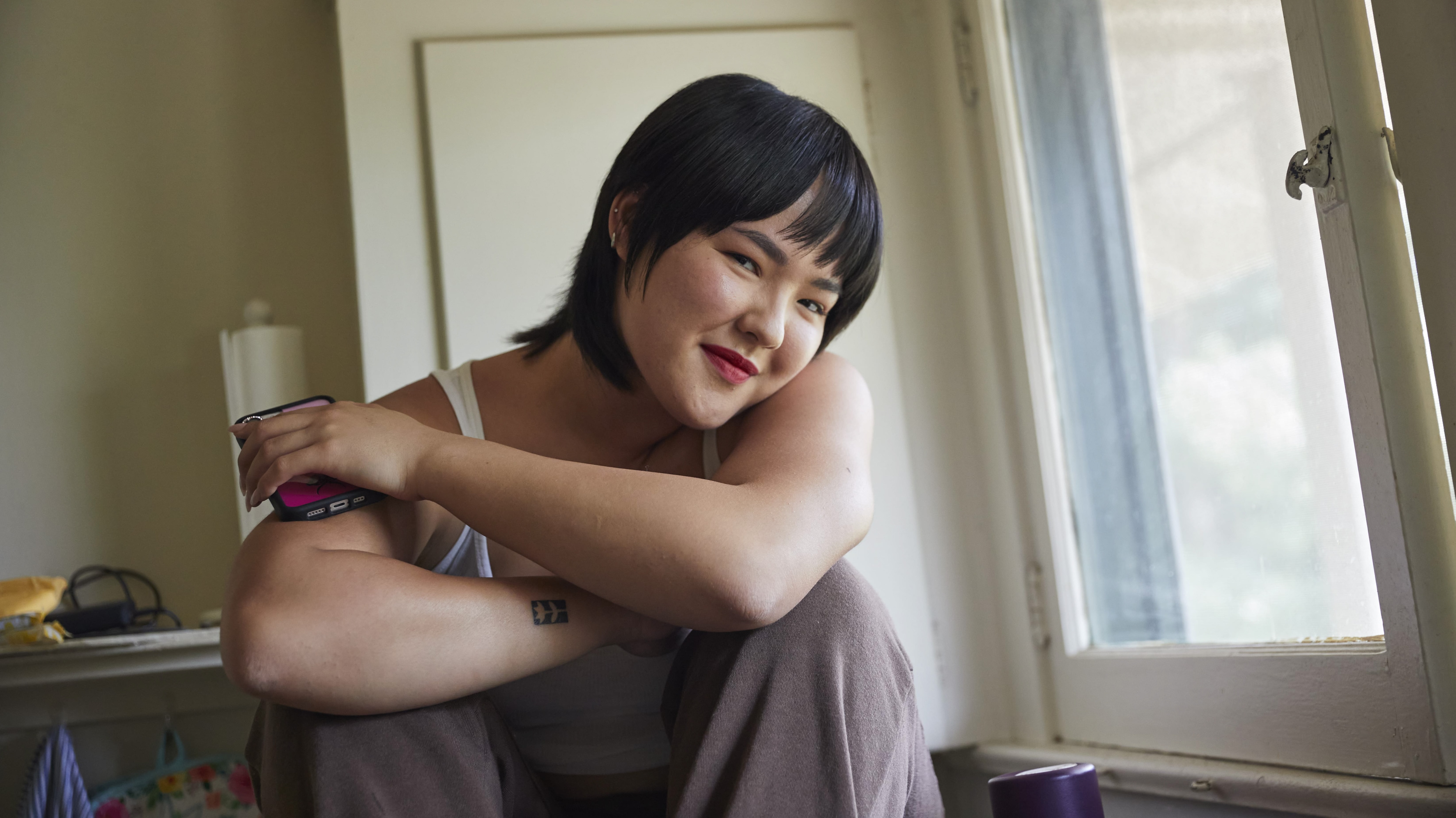 Woman with short hair smiling
