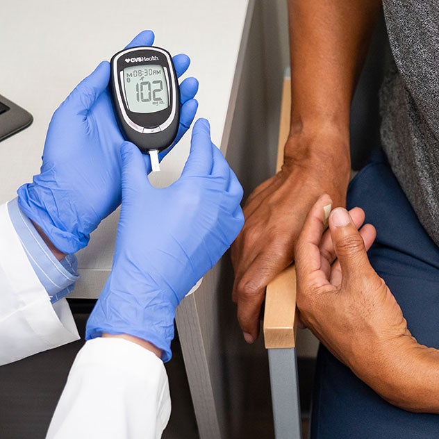Patient and medical professional reviewing test results