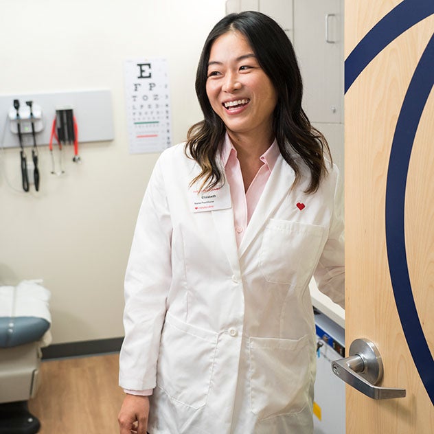 Medical professional smiling in doctors office
