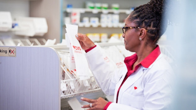 Female pharmacist filling prescriptions at CVS