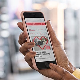 Patient checking out using CVS mobile checkout application