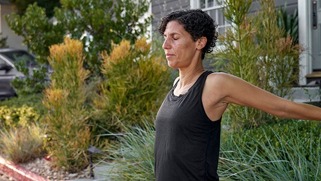 Woman stretching outside