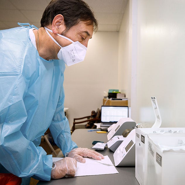 Male medical provider wearing mask