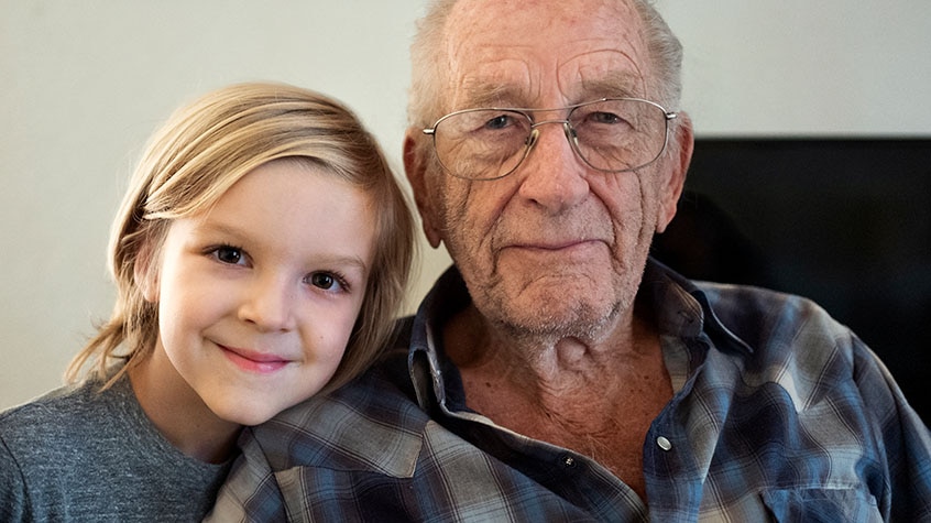 Grandfather smiling with grandson