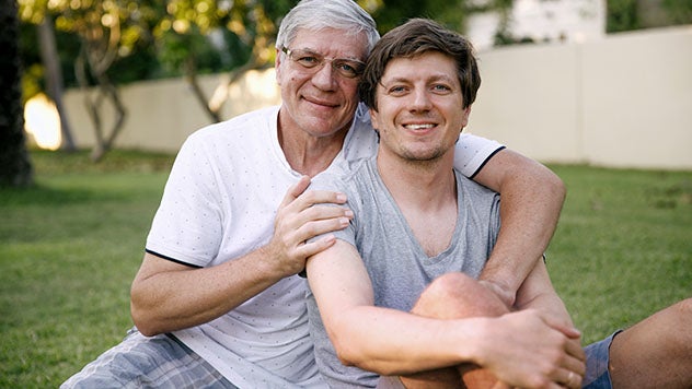 Father comforting son