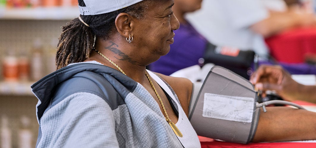 Female patient having blood pressure checked