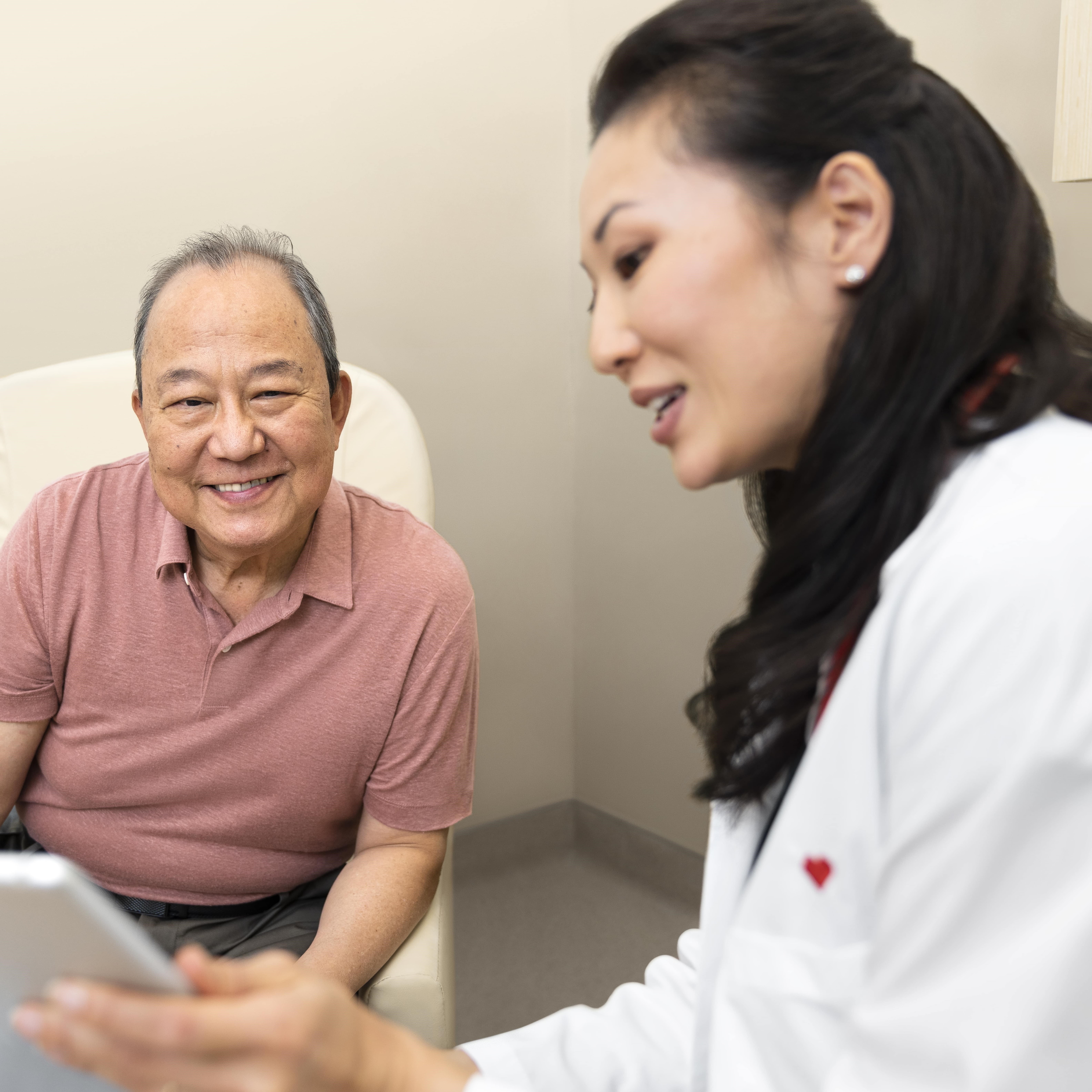 A doctor meeting with a patient